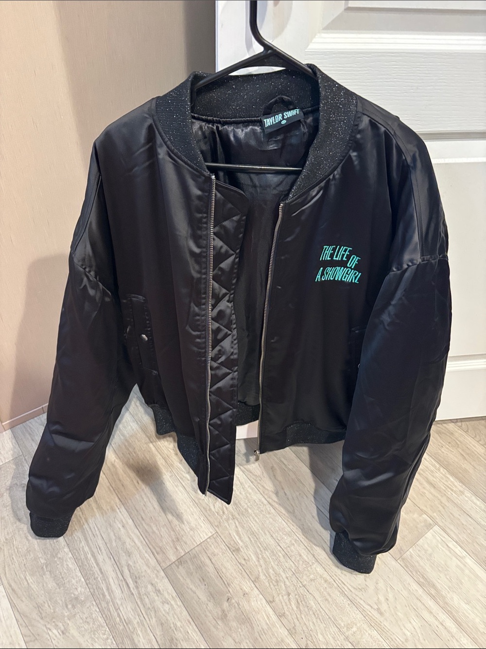 Taylor Swift Black Bomber Jacket with Teal Logo